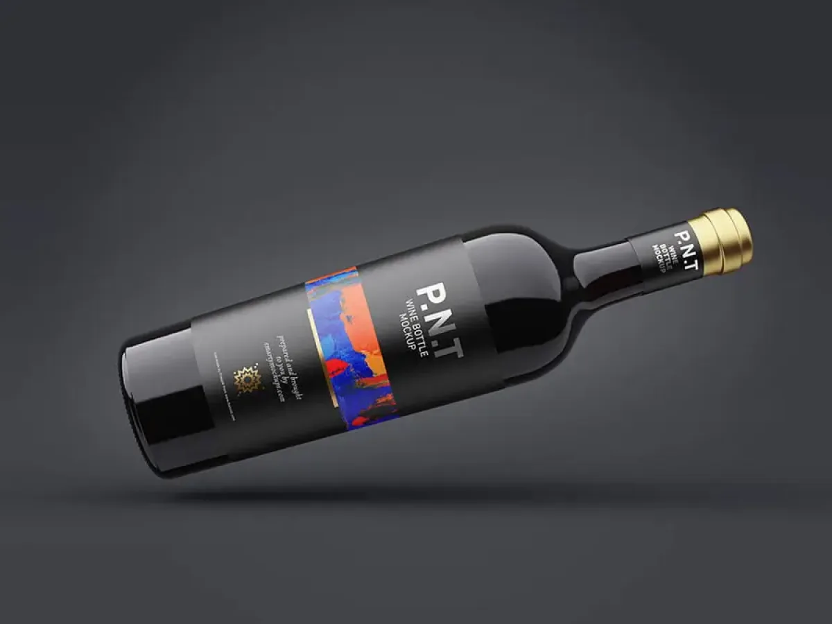 Black wine bottle with gold cap and P.N.T Wine Bottle Mockup label featuring an abstract colour panel, floating against a dark grey background.